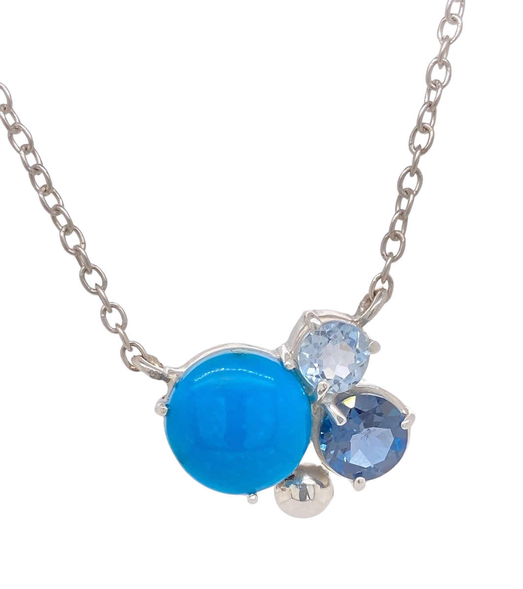 Sterling Silver Turquoise Blue Topaz 'Trois' Necklace.